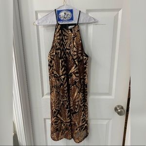 Sequined gold and black dress